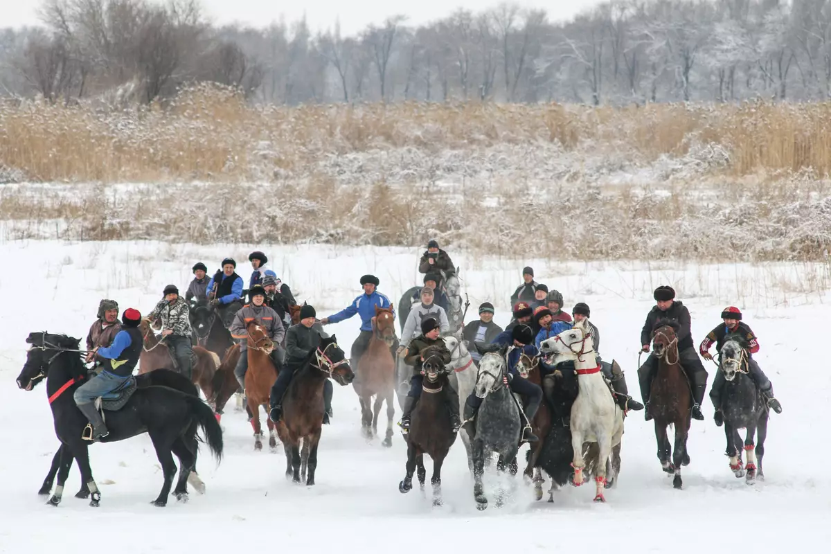 Men riding horses